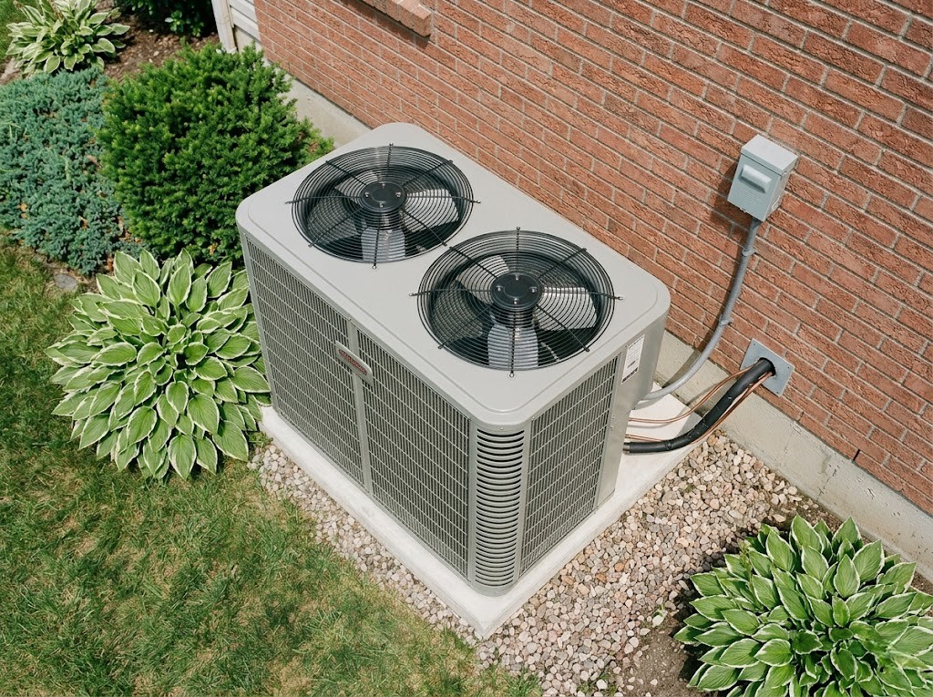 Outdoor HVAC condenser unit installed beside a residential property